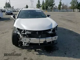 2022 Lexus UX 250h with VIN JTHX9JBH2N2056285, listed as a Copart auction lot 87221214 with 33,377 mi miles and Salvage title. Bid and sale history available at DreamBid. Image 11.