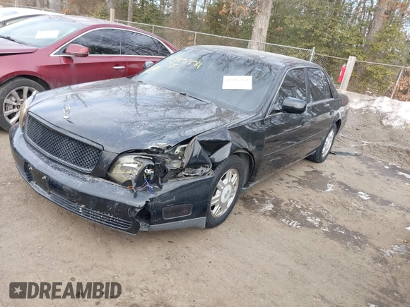 2003 Cadillac DeVille with VIN 1G6KD54Y33U126184, listed as a IAAI auction lot 41385354 with 83,982 mi miles. Bid and sale history available at carsss.com. Image 17.