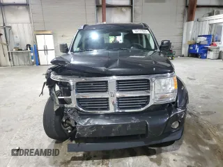 2009 Dodge Nitro SE с VIN 1D8GU28K89W531530, выставлен на аукционе Copart как лот 64177005 с пробегом 99 861 миль миль и Чистый • Clean title. История ставок и продаж доступна на DreamBid. Изображение 5.