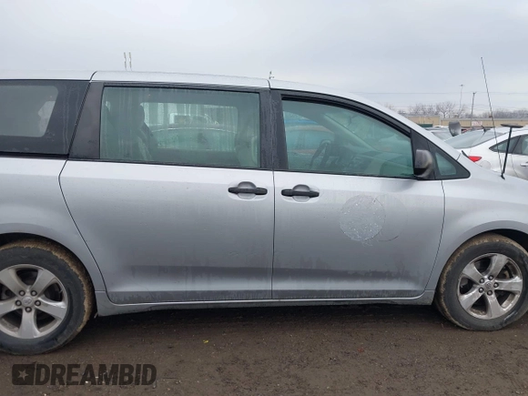 2012 Toyota Sienna with VIN 5TDZK3DC2CS221981, listed as a IAAI auction lot 41650273 with 146,652 mi miles. Bid and sale history available at carsss.com. Image 13.
