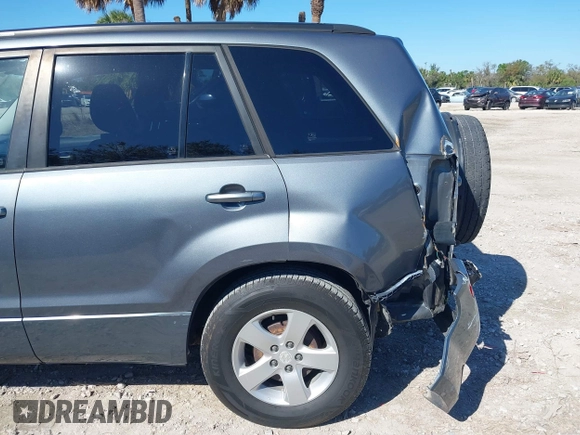 2006 Suzuki Grand Vitara Premium z VIN JS3TD943064100693, wystawiony jako IAAI lot #41772479 z przebiegiem 135 901 mil mil oraz . Historia ofert i sprzedaży dostępna na DreamBid. Obrazek 6.