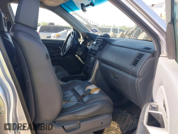 2005 Honda Pilot EX-L with VIN 5FNYF18585B061869, listed as a IAAI auction lot 41982694 with 183,873 mi miles. Bid and sale history available at carsss.com. Image 5.