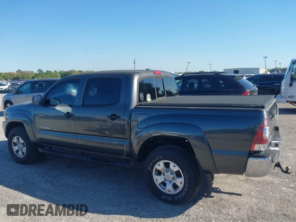 2009 Toyota Tacoma PreRunner with VIN 3TMJU62N59M088137, listed as a IAAI auction lot 41775410 with 217,331 mi miles. Bid and sale history available at carsss.com. Image 14.