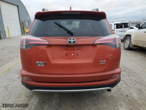 2016 Toyota RAV4 XLE with VIN 2T3RFREV5GW409440, listed as a Copart auction lot 87052294 with 0 mi miles and Salvage Title. Bid and sale history available at carsss.com. Image 6.