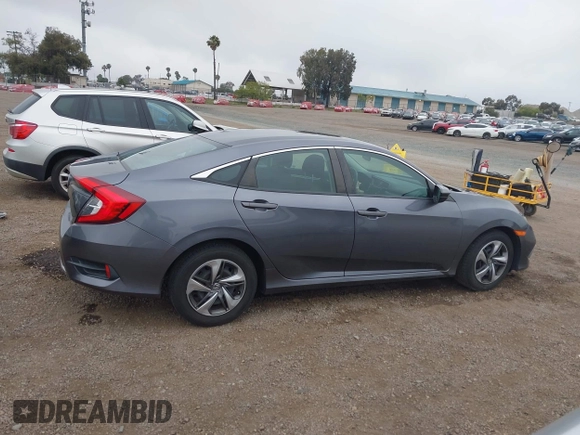2020 Honda Civic LX with VIN 2HGFC2F63LH567698, listed as a IAAI auction lot 42354886 with 70,977 mi miles and . Bid and sale history available at DreamBid. Image 14.