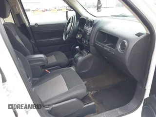 2014 Jeep Patriot Sport with VIN 1C4NJRBB9ED852112, listed as a IAAI auction lot 41886940 with 138,825 mi miles. Bid and sale history available at carsss.com. Image 5.