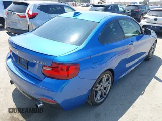 2014 BMW 2 Series M235i with VIN WBA1J7C52EVW84588, listed as a IAAI auction lot 42490194 with 103,998 mi miles and . Bid and sale history available at DreamBid. Image 4.