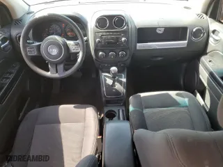 2016 Jeep Compass Sport with VIN 1C4NJDBB1GD713064, listed as a Copart auction lot 49700055 with 173,825 mi miles and Clean Title. Bid and sale history available at carsss.com. Image 8.