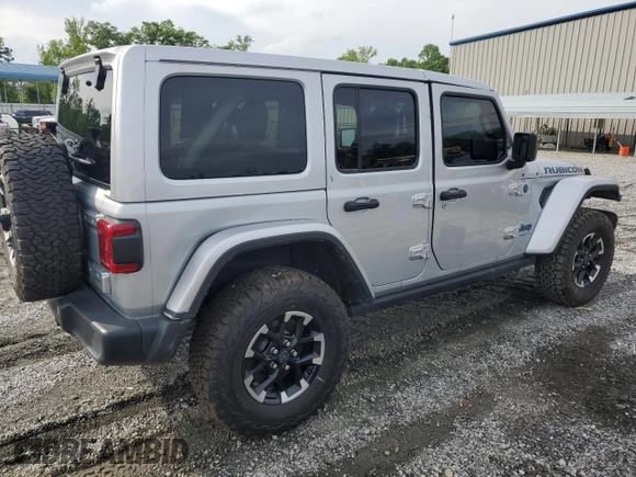 2024 Jeep Wrangler Rubicon with VIN 1C4RJXR6XRW292478, listed as a Copart auction lot 55655575 with 11,122 mi miles and Salvage Title. Bid and sale history available at DreamBid. Image 4.