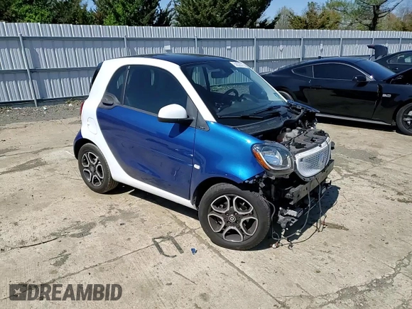 2016 Smart fortwo Passion z VIN WMEFJ5DA6GK064695, wystawiony jako Copart lot #53528315 z przebiegiem 53 508 mil mil oraz Szkody całkowita. Historia ofert i sprzedaży dostępna na DreamBid. Obrazek 11.