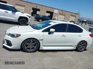 2021 Subaru WRX z VIN JF1VA1A68M9801794, wystawiony jako IAAI lot #42421444 z przebiegiem 100 920 mil mil oraz . Historia ofert i sprzedaży dostępna na DreamBid. Obrazek 14.