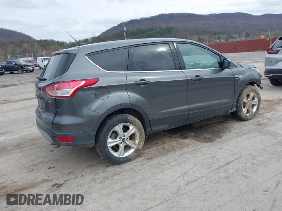 2015 Ford Escape SE with VIN 1FMCU0G79FUC53934, listed as a IAAI auction lot 41912831 with 117,197 mi miles. Bid and sale history available at carsss.com. Image 4.