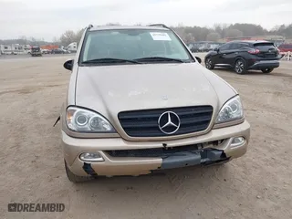 2002 Mercedes-Benz M-Class with VIN 4JGAB54E82A308902, listed as a IAAI auction lot 41779482 with 99,933 mi miles. Bid and sale history available at carsss.com. Image 6.