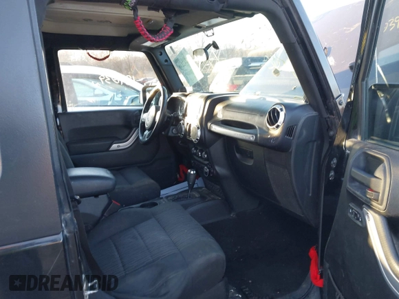 2011 Jeep Wrangler Rubicon with VIN 1J4HA6D11BL564211, listed as a IAAI auction lot 41242240 with 124,039 mi miles and . Bid and sale history available at carsss.com. Image 5.
