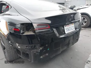 2022 Tesla Model S with VIN 5YJSA1E55NF474342, listed as a IAAI auction lot 41870994 with 33,804 mi miles and . Bid and sale history available at DreamBid. Image 6.