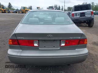 2001 Toyota Camry CE z VIN 4T1BG22K31U097733, wystawiony jako IAAI lot #42276687 z przebiegiem 180 357 mil mil oraz . Historia ofert i sprzedaży dostępna na DreamBid. Obrazek 16.