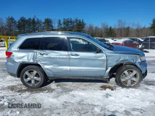 2013 Jeep Grand Cherokee Overland with VIN 1C4RJFCTXDC541770, listed as a IAAI auction lot 41610600 with 164,065 mi miles. Bid and sale history available at carsss.com. Image 13.