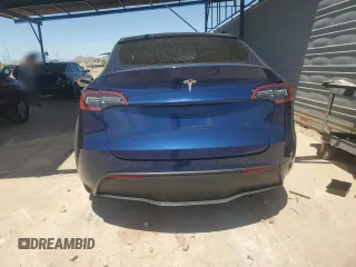 2023 Tesla Model Y Long Range with VIN 7SAYGDEE7PA112865, listed as a Copart auction lot 54626685 with 10,720 mi miles and Salvage Title. Bid and sale history available at DreamBid. Image 6.