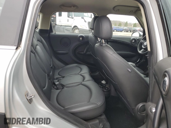 2014 MINI Countryman z VIN WMWZB3C55EWR36269, wystawiony jako Copart lot #51845265 z przebiegiem 167 558 mil mil oraz Czysty tytuł • Clean title. Historia ofert i sprzedaży dostępna na DreamBid. Obrazek 10.