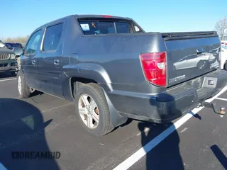2009 Honda Ridgeline RTL with VIN 2HJYK16589H502832, listed as a IAAI auction lot 41878496 with 101,695 mi miles and . Bid and sale history available at DreamBid. Image 3.