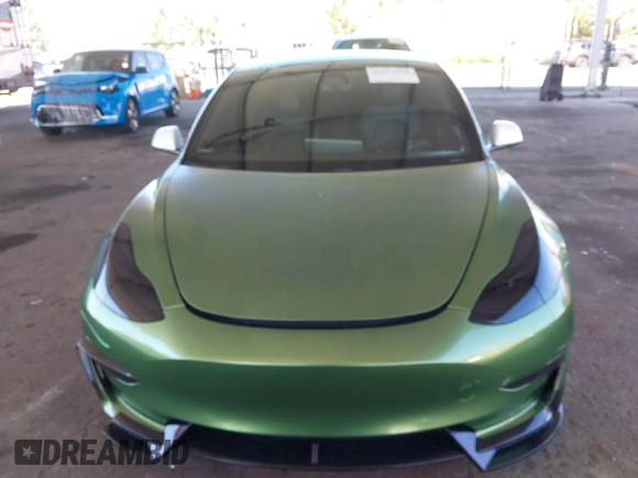 2020 Tesla Model 3 Standard Range Plus with VIN 5YJ3E1EA4LF799650, listed as a IAAI auction lot 41817538 with 54,835 mi miles. Bid and sale history available at carsss.com. Image 12.