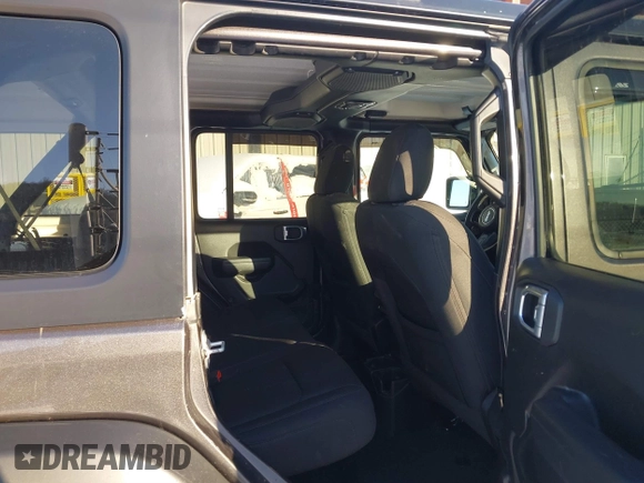 2022 Jeep Wrangler Unlimited Sport with VIN 1C4HJXDG5NW157317, listed as a IAAI auction lot 41374590 with 67,632 mi miles and . Bid and sale history available at DreamBid. Image 8.