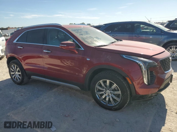 2022 Cadillac XT4 FWD Premium Luxury with VIN 1GYFZCR43NF154997, listed as a Copart auction lot 81942214 with 22,697 mi miles and Salvage title. Bid and sale history available at DreamBid. Image 4.