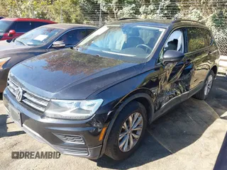 2018 Volkswagen Tiguan SEL z VIN 3VV2B7AX9JM142564, wystawiony jako IAAI lot #40630666 z przebiegiem 86 040 mil mil oraz . Historia ofert i sprzedaży dostępna na DreamBid. Obrazek 2.