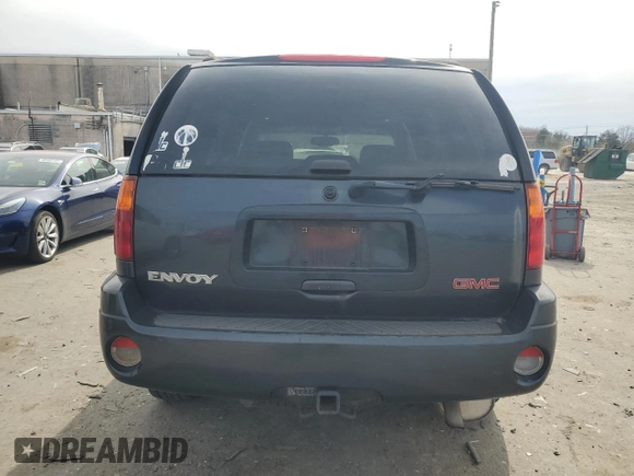 2003 GMC Envoy SLT with VIN 1GKDT13S232107429, listed as a Copart auction lot 48615135 with 245,956 mi miles and Clean Title. Bid and sale history available at carsss.com. Image 6.