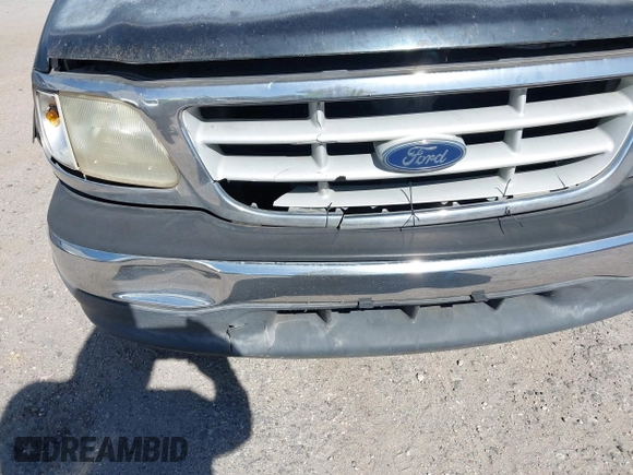 1999 Ford F-150 z VIN 1FTZX1725XKA26611, wystawiony jako IAAI lot #42037812 z przebiegiem Nie podano mil oraz . Historia ofert i sprzedaży dostępna na DreamBid. Obrazek 6.