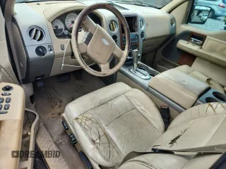 2004 Ford F-150 XL with VIN 1FTPX12564NA87792, listed as a Copart auction lot 60489655 with 396,269 mi miles and Salvage title. Bid and sale history available at DreamBid. Image 8.