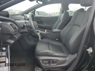 2023 Subaru Solterra Premium с VIN JTMABABA7PA044284, выставлен на аукционе Copart как лот 54517245 с пробегом 6 647 миль миль и На запчасти • Non repairable. История ставок и продаж доступна на DreamBid. Изображение 7.