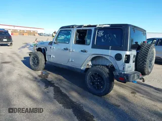2023 Jeep Wrangler z VIN 1C4JJXN62PW628429, wystawiony jako IAAI lot #40861135 z przebiegiem 33 923 mil mil oraz . Historia ofert i sprzedaży dostępna na DreamBid. Obrazek 3.