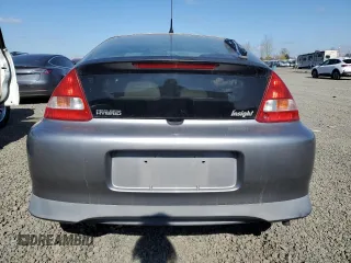 2004 Honda Insight z VIN JHMZE14754T000181, wystawiony jako Copart lot #47235695 z przebiegiem 109 712 mil mil oraz Czysty tytuł • Clean title. Historia ofert i sprzedaży dostępna na DreamBid. Obrazek 6.