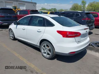 2017 Ford Focus SE with VIN 1FADP3F24HL232527, listed as a IAAI auction lot 42110702 with 95,327 mi miles and . Bid and sale history available at DreamBid. Image 3.