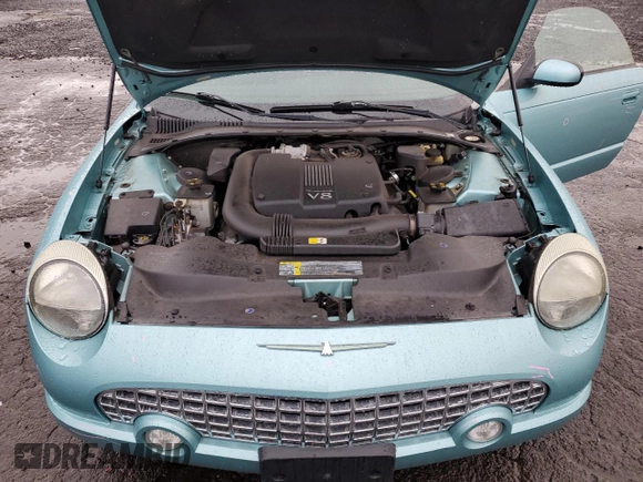 2002 Ford Thunderbird Hardtop Premium with VIN 1FAHP60A02Y121714, listed as a Copart auction lot 77852994 with 132,049 mi miles and Salvage Title. Bid and sale history available at DreamBid. Image 11.