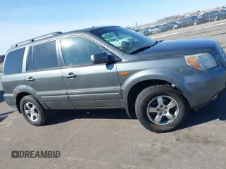 2007 Honda Pilot EX-L with VIN 2HKYF18667H501911, listed as a IAAI auction lot 41752356 with 267,277 mi miles and . Bid and sale history available at DreamBid. Image 13.