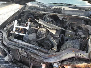 1999 Jeep Grand Cherokee Laredo z VIN 1J4GW58N1XC737706, wystawiony jako Copart lot #83107914 z przebiegiem Nie podano mil oraz Szkoda całkowita • Salvage title. Historia ofert i sprzedaży dostępna na DreamBid. Obrazek 14.