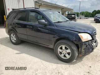 2008 Kia Sorento LX z VIN KNDJC735885819431, wystawiony jako Copart lot #56649295 z przebiegiem 106 298 mil mil oraz Szkoda całkowita • Salvage title. Historia ofert i sprzedaży dostępna na DreamBid. Obrazek 4.