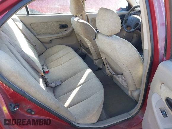 2003 Hyundai Elantra GLS z VIN KMHDN45D93U469313, wystawiony jako IAAI lot #41697422 z przebiegiem 178 571 mil mil oraz . Historia ofert i sprzedaży dostępna na DreamBid. Obrazek 8.