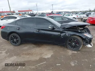 2015 Infiniti Q50 with VIN JN1BV7AP3FM347809, listed as a IAAI auction lot 41821304 with 107,733 mi miles and . Bid and sale history available at carsss.com. Image 13.