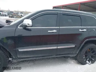2012 Jeep Grand Cherokee Limited with VIN 1C4RJFBGXCC179054, listed as a IAAI auction lot 41729596 with 207,257 mi miles. Bid and sale history available at carsss.com. Image 13.