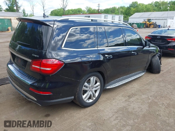 2017 Mercedes-Benz GLS 450 with VIN 4JGDF6EE0HA760910, listed as a IAAI auction lot 42210919 with 140,971 mi miles and . Bid and sale history available at DreamBid. Image 4.