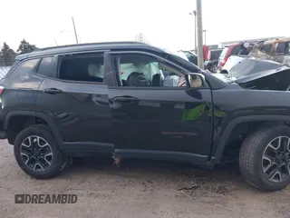 2019 Jeep Compass Trailhawk with VIN 3C4NJDDB0KT671633, listed as a IAAI auction lot 38411581 with Not Provided miles and . Bid and sale history available at carsss.com. Image 12.
