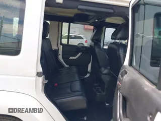 2015 Jeep Wrangler Unlimited Rubicon z VIN 1C4BJWFG1FL544883, wystawiony jako IAAI lot #42838891 z przebiegiem 87 801 mil mil oraz . Historia ofert i sprzedaży dostępna na DreamBid. Obrazek 8.