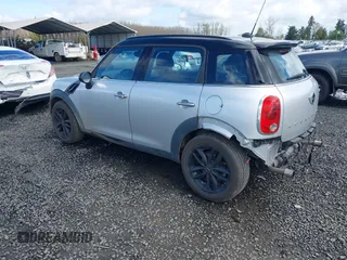 2014 MINI Countryman S z VIN WMWZC3C56EWP26003, wystawiony jako IAAI lot #41884630 z przebiegiem 101 683 mil mil oraz . Historia ofert i sprzedaży dostępna na DreamBid. Obrazek 3.