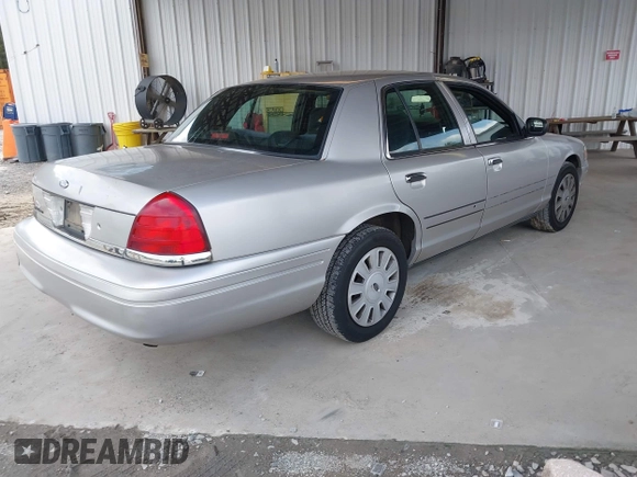 2006 Ford Police Interceptor with VIN 2FAFP71W96X127900, listed as a IAAI auction lot 42246927 with Not provided miles and . Bid and sale history available at DreamBid. Image 4.