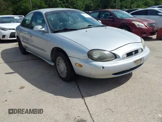 1998 Mercury Sable GS z VIN 1MEFM50U2WG637727, wystawiony jako IAAI lot #42316281 z przebiegiem 195 706 mil mil oraz . Historia ofert i sprzedaży dostępna na DreamBid. Obrazek 1.