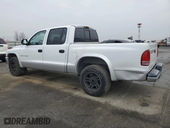 2002 Dodge Dakota SLT z VIN 1B7HL48N22S636413, wystawiony jako Copart lot #47884475 z przebiegiem 226 723 mil mil oraz Czysty tytuł • Clean title. Historia ofert i sprzedaży dostępna na DreamBid. Obrazek 2.