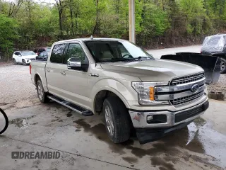 2018 Ford F-150 XL with VIN 1FTEW1C5XJFB08934, listed as a Copart auction lot 58098725 with 148,449 mi miles and Clean title. Bid and sale history available at DreamBid. Image 4.